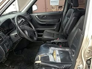 ugly crv interior with taped up seats