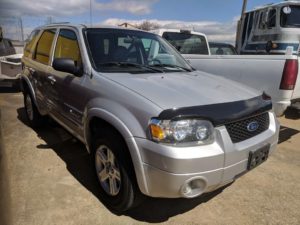 silver ford escape with rust