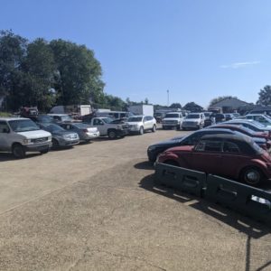 ugly cars on a dealer back lot