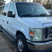 More miles on it than your mom & can handle 15 dudes at once. 2009 Ford Passenger Van