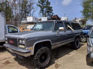 lifted square body suburban on boggers