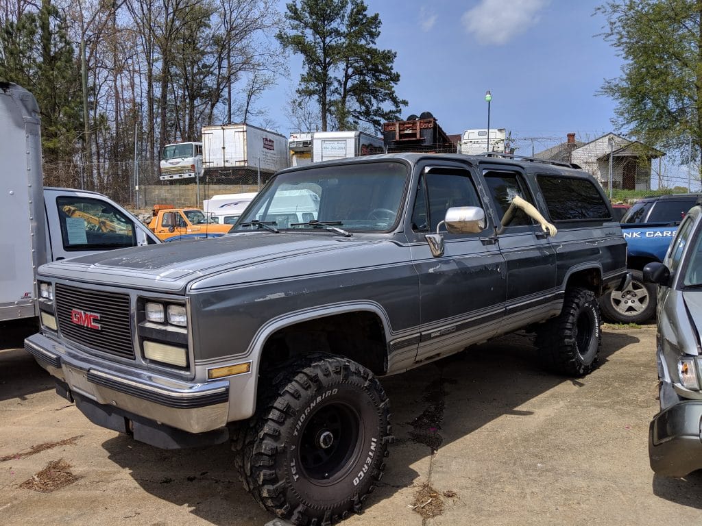 lifted square body suburban on boggers
