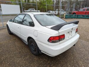 white honda civic ek coupe with a wing